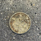 Mexico 50 Centavos Silver (Rare) Coin back on a concrete background. - Mountainstruck Coin Jewelry