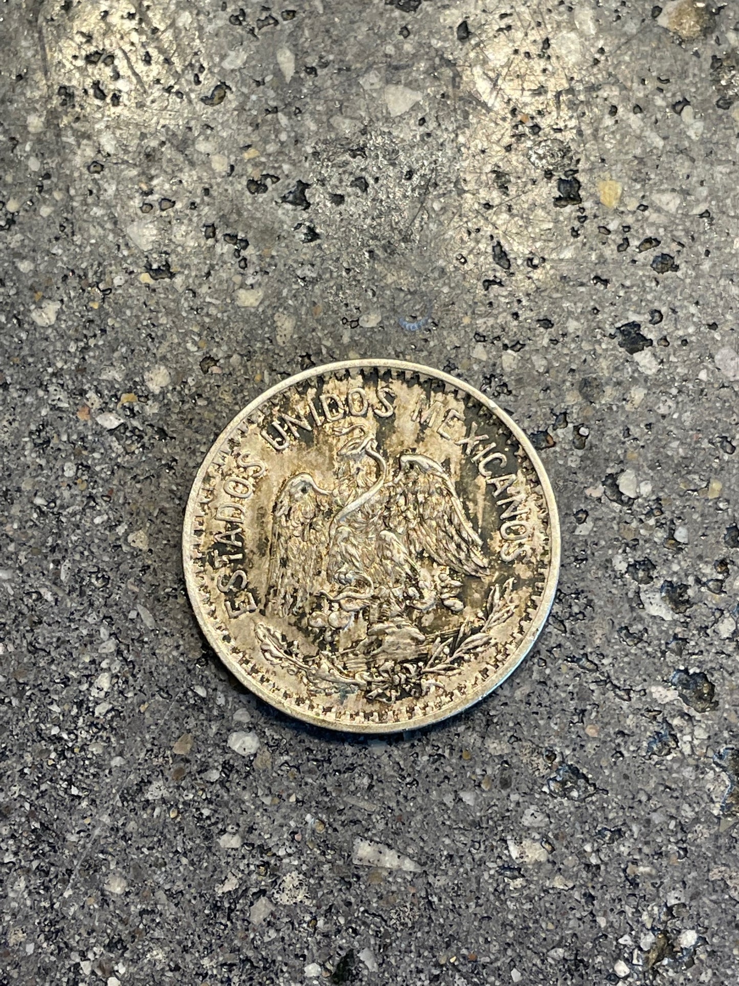 Mexico 50 Centavos Silver (Rare) Coin front on a concrete background. - Mountainstruck Coin Jewelry