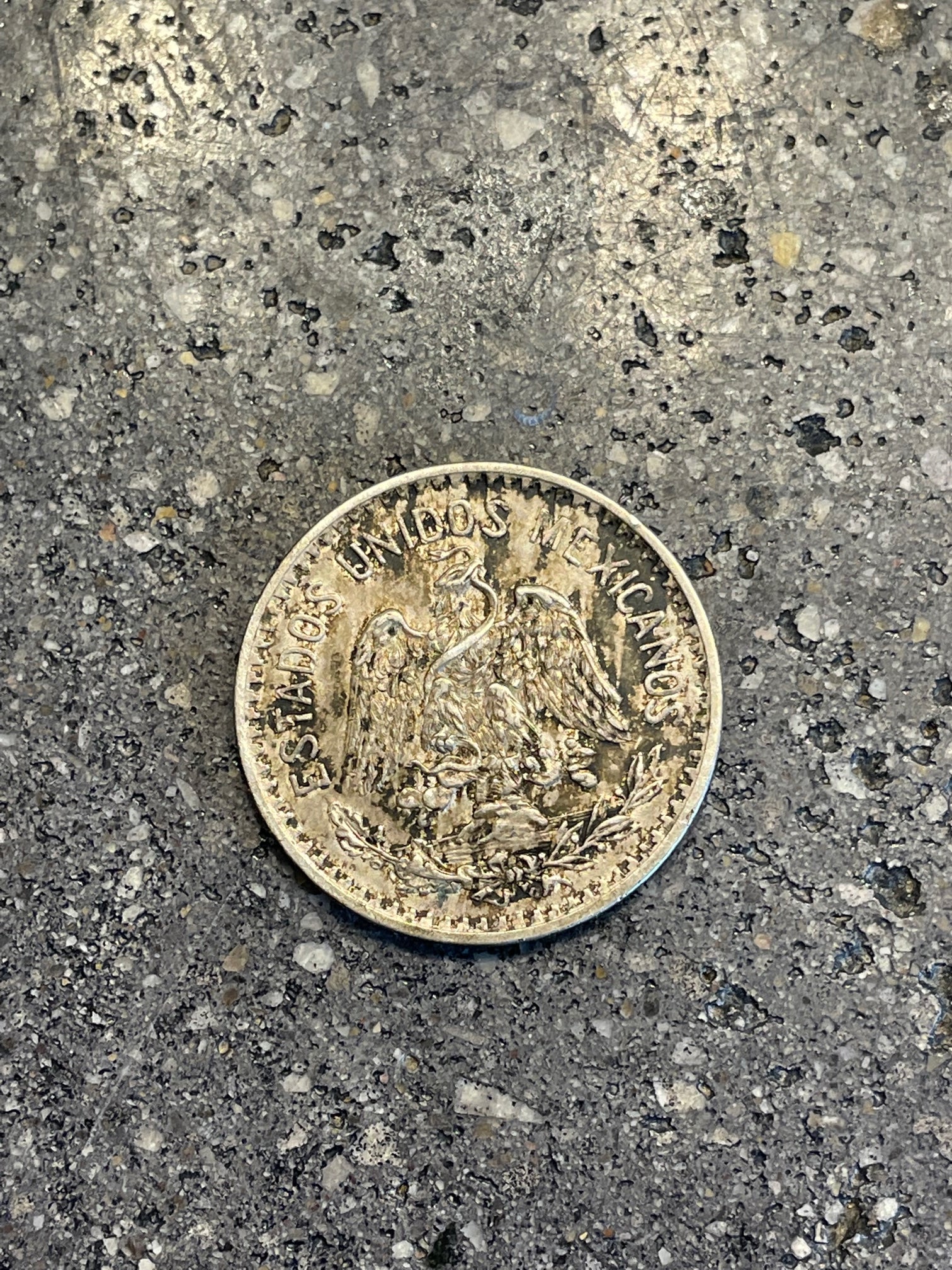 Mexico 50 Centavos Silver (Rare) Coin front on a concrete background. - Mountainstruck Coin Jewelry