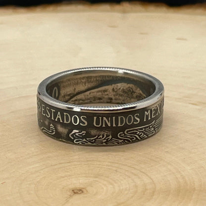 Mexico Peso Coin Ring on a light wood round. - Mountainstruck Coin Jewelry