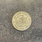 Mexico Silver Peso Coin back on a concrete background. - Mountainstruck Coin Jewelry