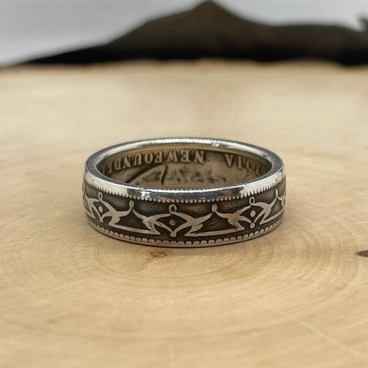 Newfoundland Early 50 Cents Silver Coin Ring on a light wood round. - Mountainstruck Coin Jewelry