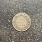 Newfoundland Early 50 Cents Silver Coin back on concrete background. - Mountainstruck Coin Jewelry
