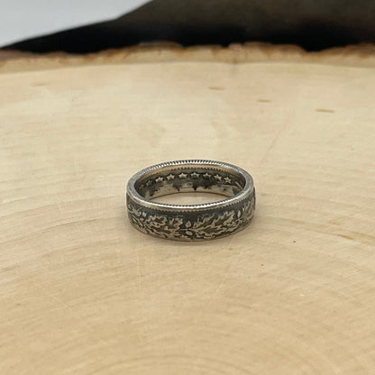 Swiss 1/2 Franc Silver Coin Ring on a light wood round. - Mountainstruck Coin Jewelry