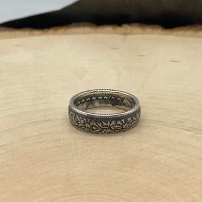 Swiss 1/2 Franc Silver Coin Ring on a light wood round. - Mountainstruck Coin Jewelry
