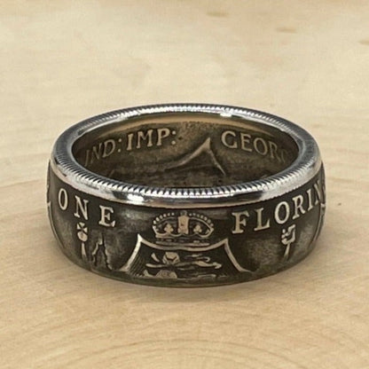 UK One Florin Silver Coin Ring on a light wood round. - Mountainstruck Coin Jewelry