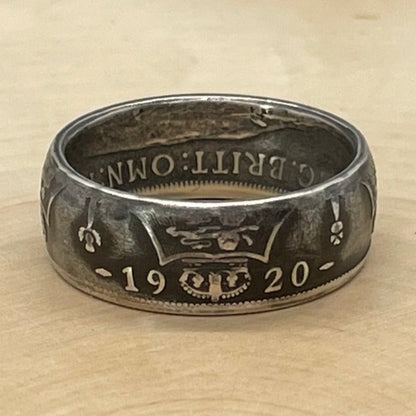 UK One Florin Silver Coin Ring on a light wood round.  - Mountainstruck Coin Jewelry
