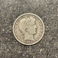 Barber Silver Half Dollar front of coin on a concrete background. - Mountainstruck Coin Jewelry