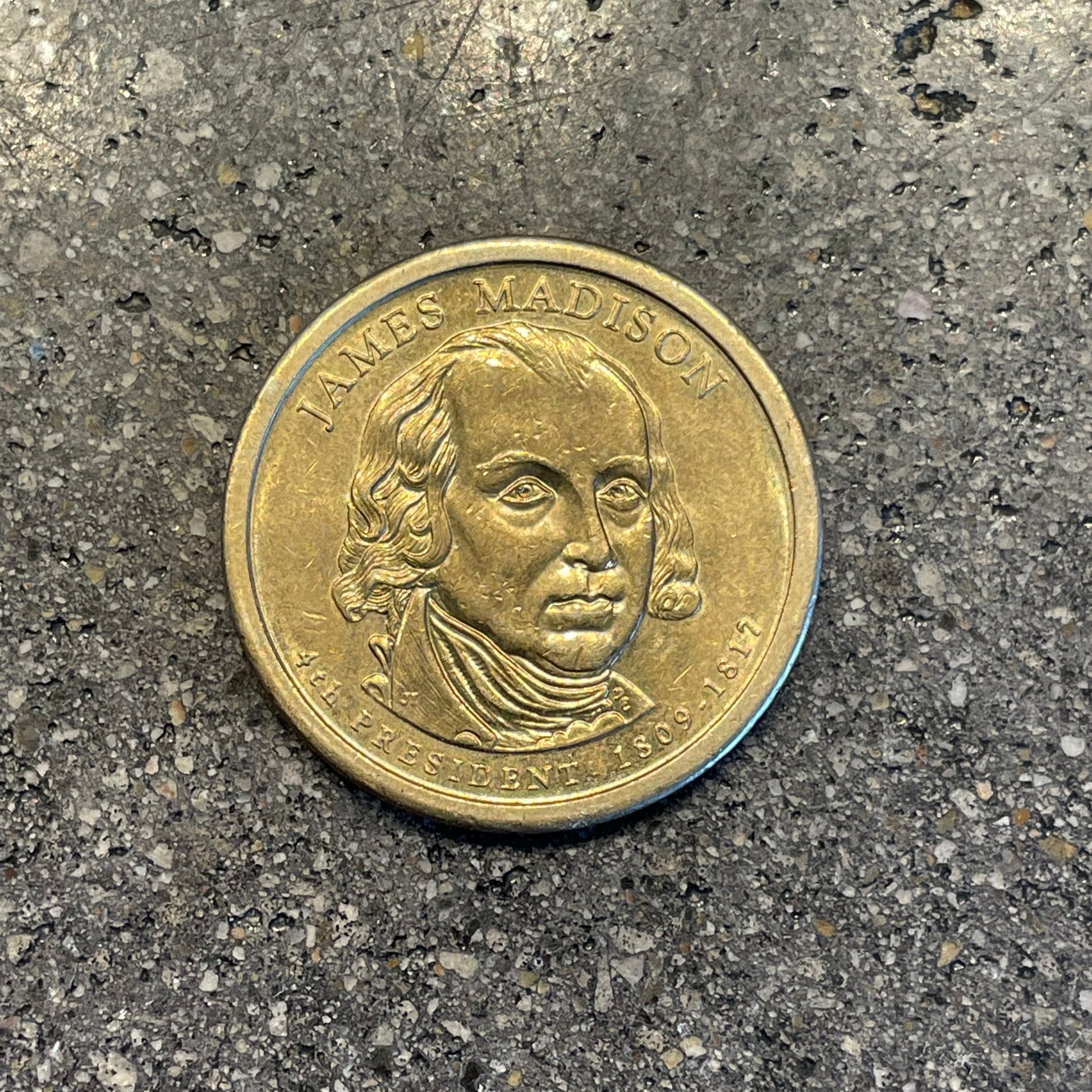 U.S. Presidential Dollar Coin front on a concrete background. - Mountainstruck Coin Jewelry