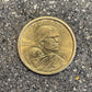 U.S. Sacagawea Dollar Coin front on a concrete background. - Mountainstruck Coin Jewelry