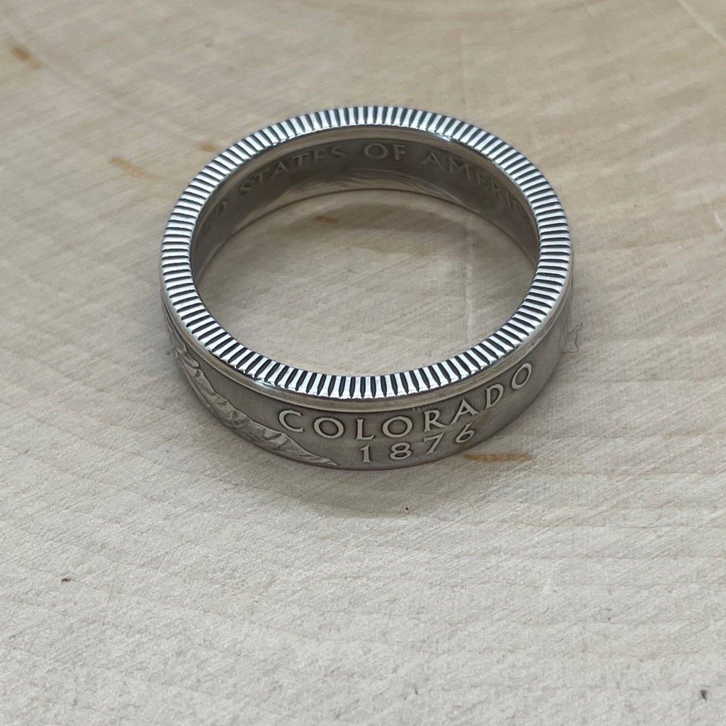 U.S. Silver State Quarter Coin Ring featuring Colorado on a light wood round. - Mountainstruck Coin Jewelry