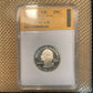 U.S. State Quarter Silver Coin front in plastic verification case on a woven background. - Mountainstruck Coin Jewelry