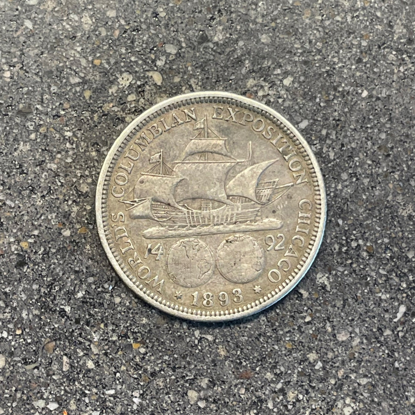 U.S. 1892-1893 Chicago Columbus Half Dollar Silver Coin back on a concrete background. - Mountainstruck Coin Jewelry