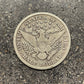 U.S. Barber Silver Half Dollar back of  coin on a concrete background. - Mountainstruck Coin Jewelry