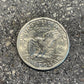 U.S. Susan B. Anthony Dollar Coin back on a concrete background. - Mountainstruck Coin Jewelry