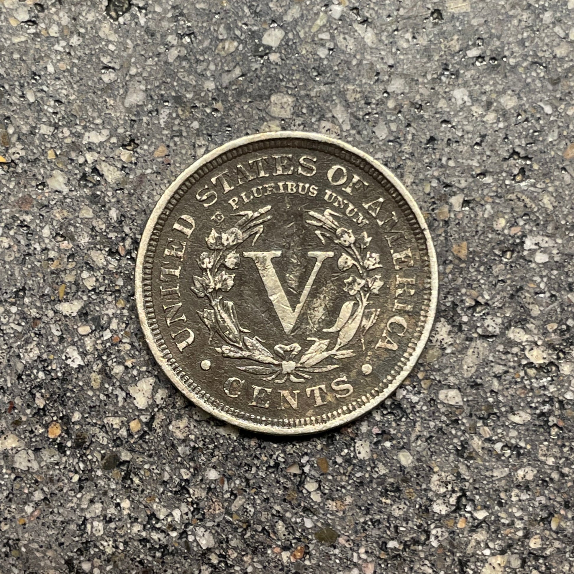 "V" Nickel coin backside on concrete background. - Mountainstruck Coin Jewelry