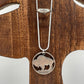 U.S. Buffalo Nickel (Reverse) Coin Necklace with a snake chain on a wood tree background.