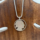 U.S. Buffalo Nickel (Front) Coin Necklace with a snake chain on a wood tree background.