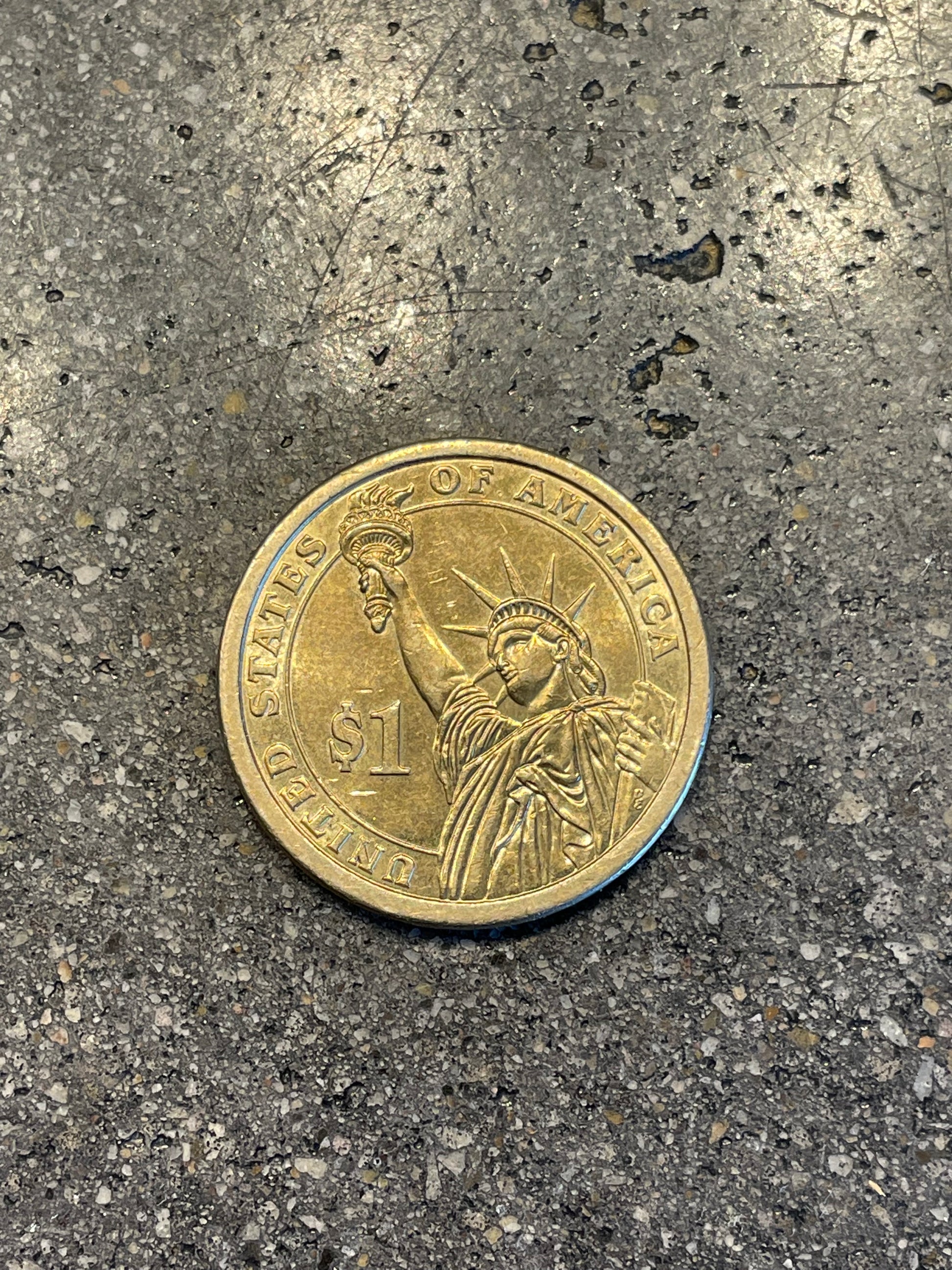Gold U.S. Presidential Dollar Coin back on a concrete background - Mountainstruck Coin Jewelry