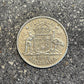 Australia Silver Florin back of coin on a concrete background.